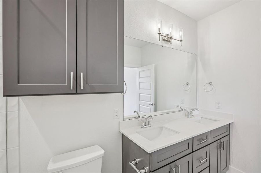There's two full bathrooms on the second level. (Sample photo of finishes andlayout)