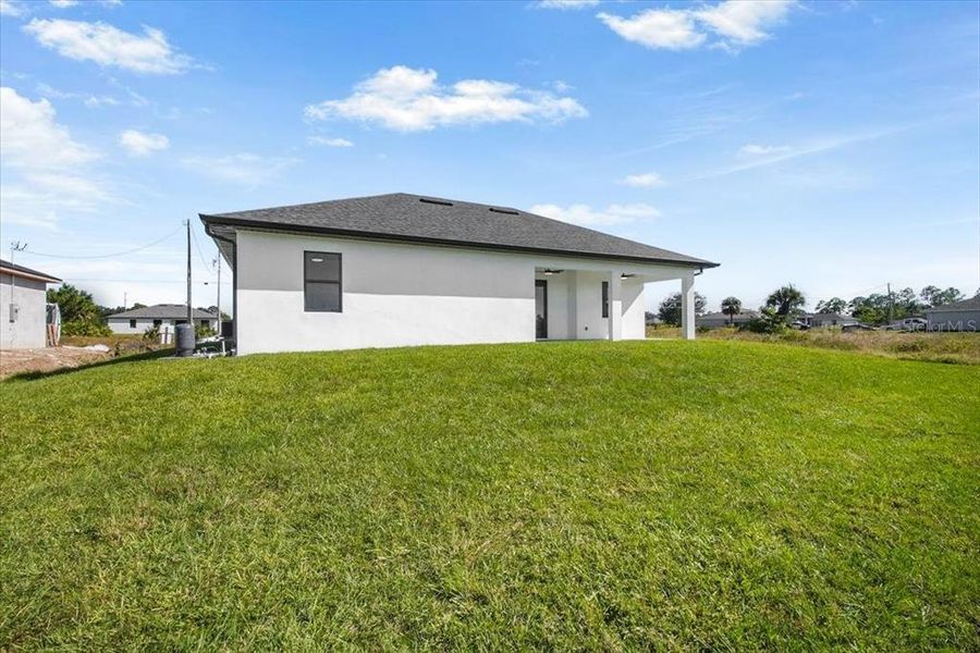 Exterior details and patio area of a home in , Lehigh Acres (Image 15).
