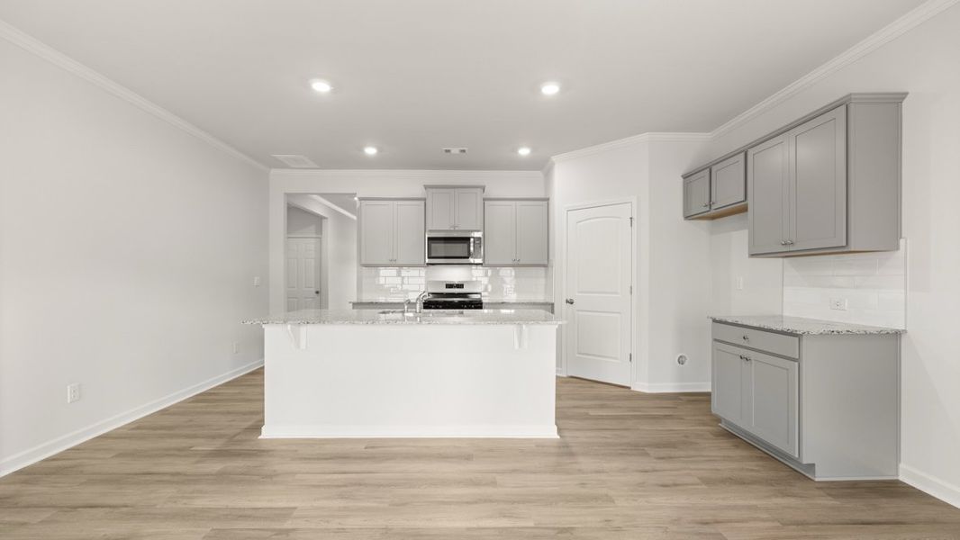 Representative furnished interior of a home built from the Cali by D.R. Horton in Sheffield Highlands, Dallas (Image 8).
