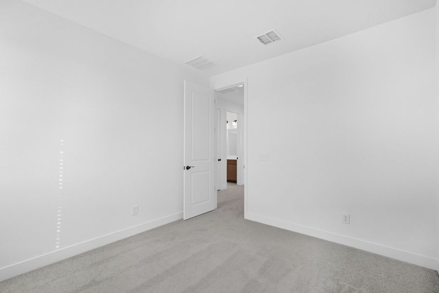 Spacious, unfurnished interior of a new home in Artisan at Asante, Surprise (Image 26).