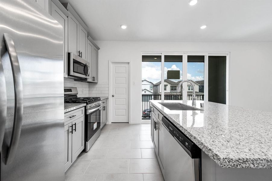 Kitchen features plenty of countertop space as well as a stainless steel appliances. Kitchen features plenty of countertop space as well as a stainless steel appliances.