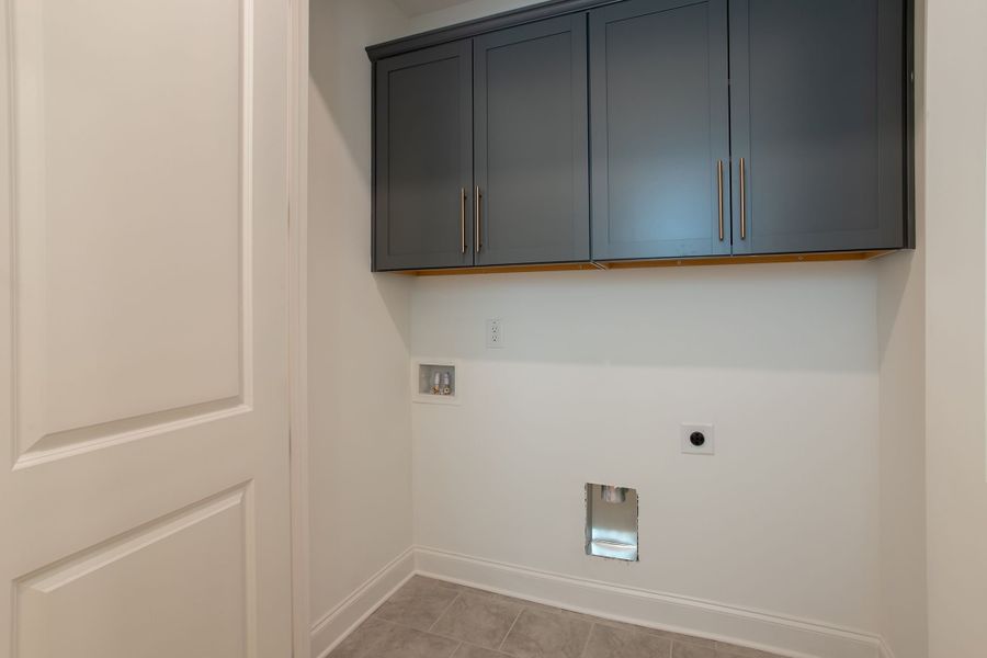 Desirable downstairs laundry room