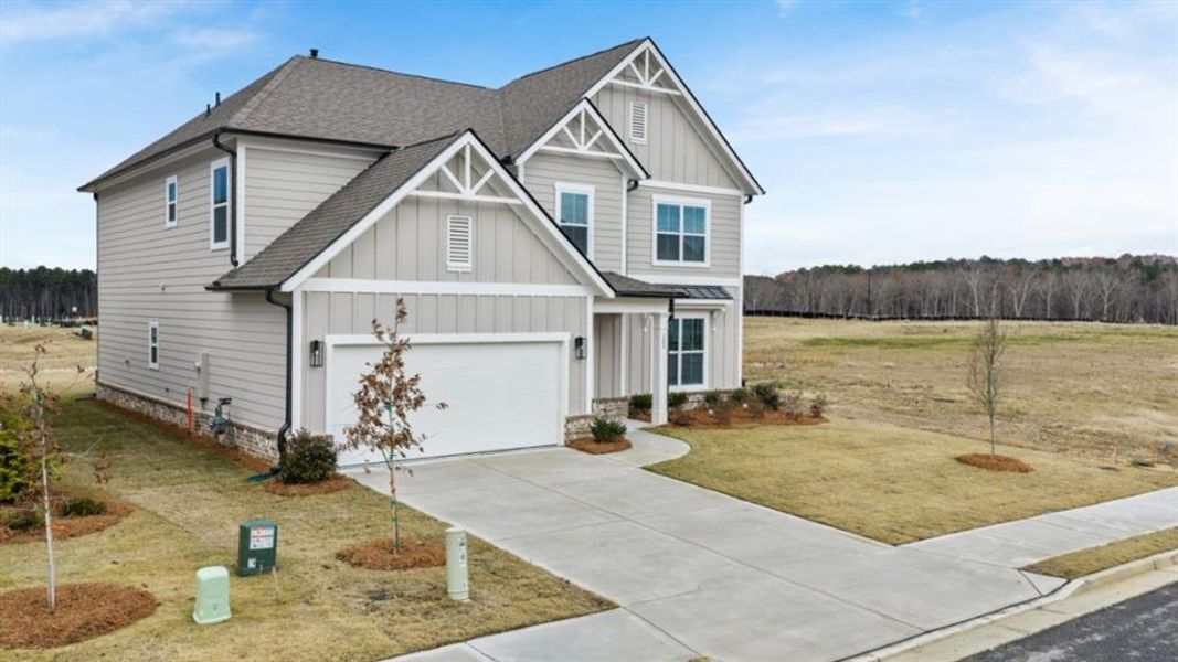 Front exterior of a new home in Hamptons at Riverwood East, Dallas, GA, highlighting curb appeal (Image 22). Front exterior of a new home in Hamptons at Riverwood East, Dallas, GA, highlighting curb appeal (Image 22).