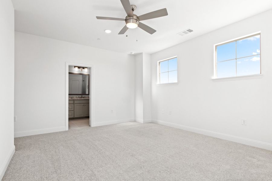 Spacious, unfurnished interior of a new home in The Tribute, The Colony (Image 33).