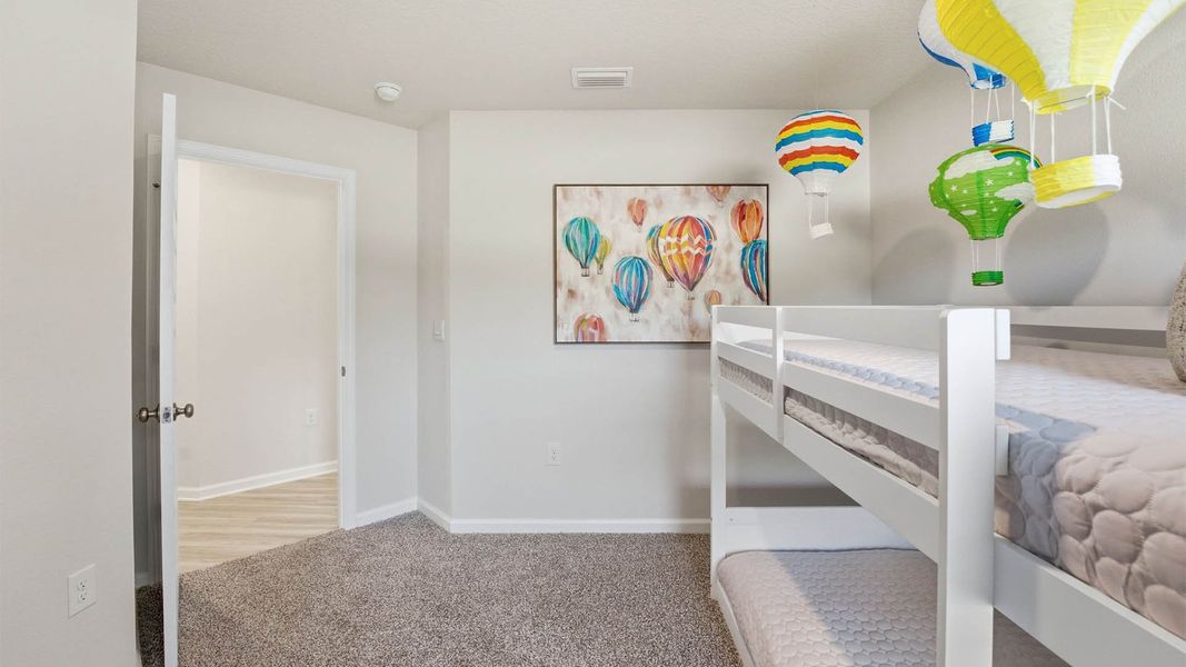 Furnished interior view inside a new home in Chateau Nemours, Port Saint Joe (Image 26).