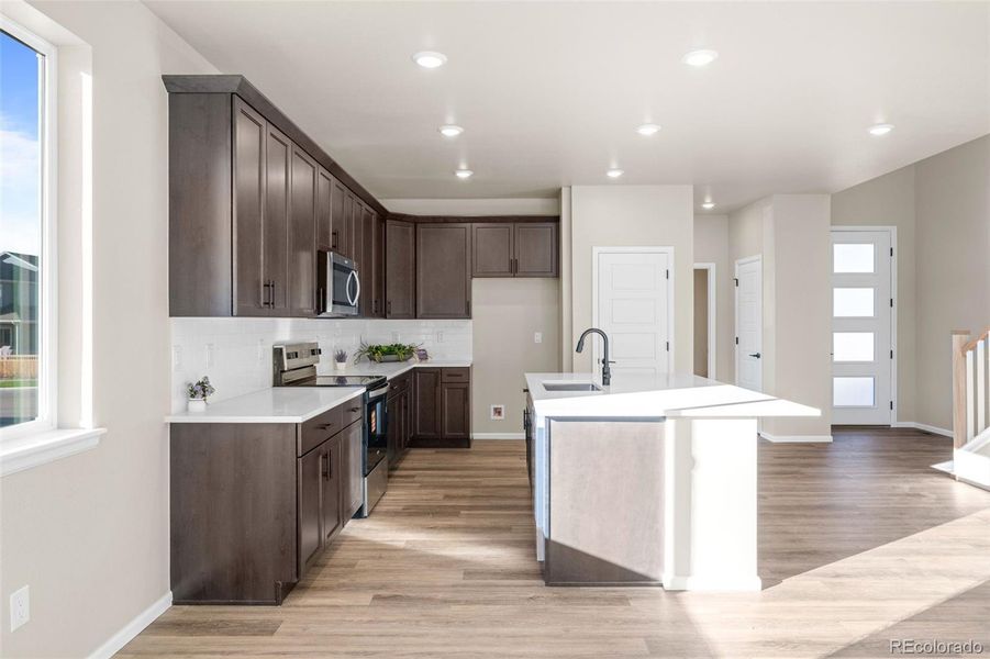Furnished interior view inside a new home in Painted Prairie, Aurora (Image 15).
