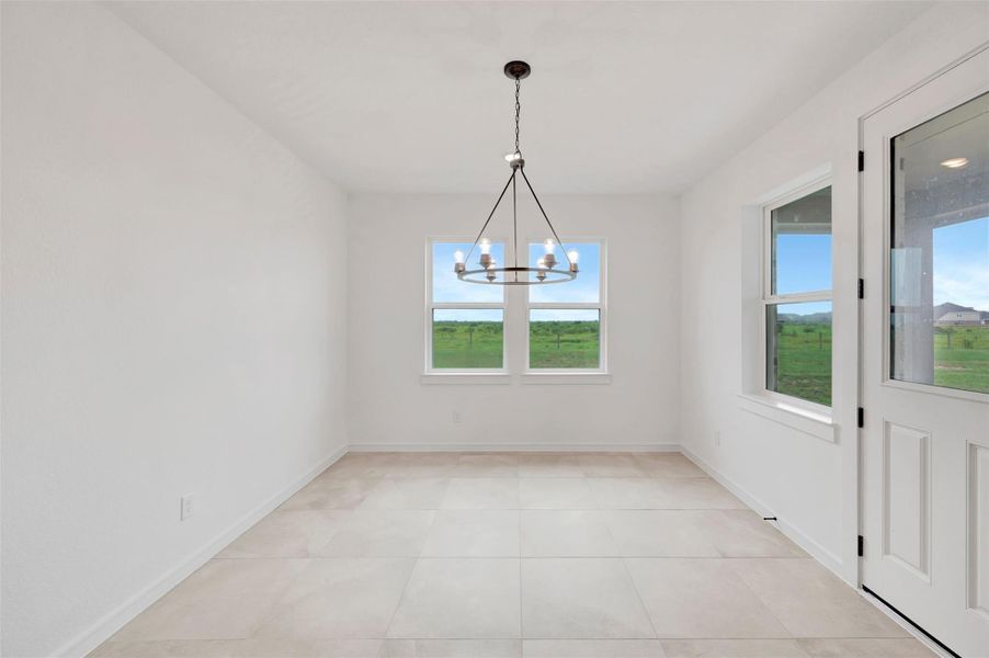 Formal dining room with access to the covered patio