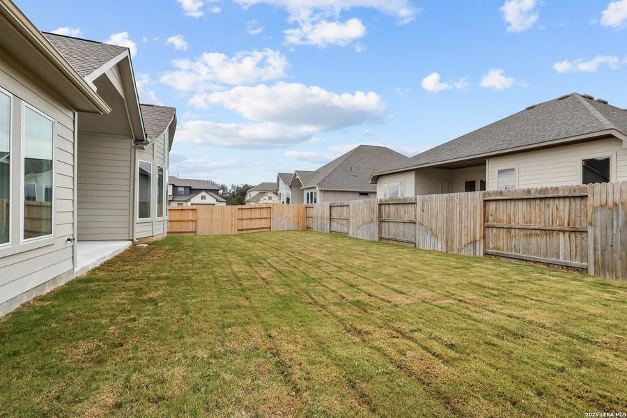 Exterior details and patio area of a home in Buffalo Crossing, Cibolo (Image 24).