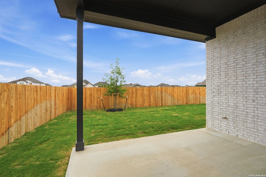 Exterior details and patio area of a home in Alsatian Oaks, Castroville (Image 27).