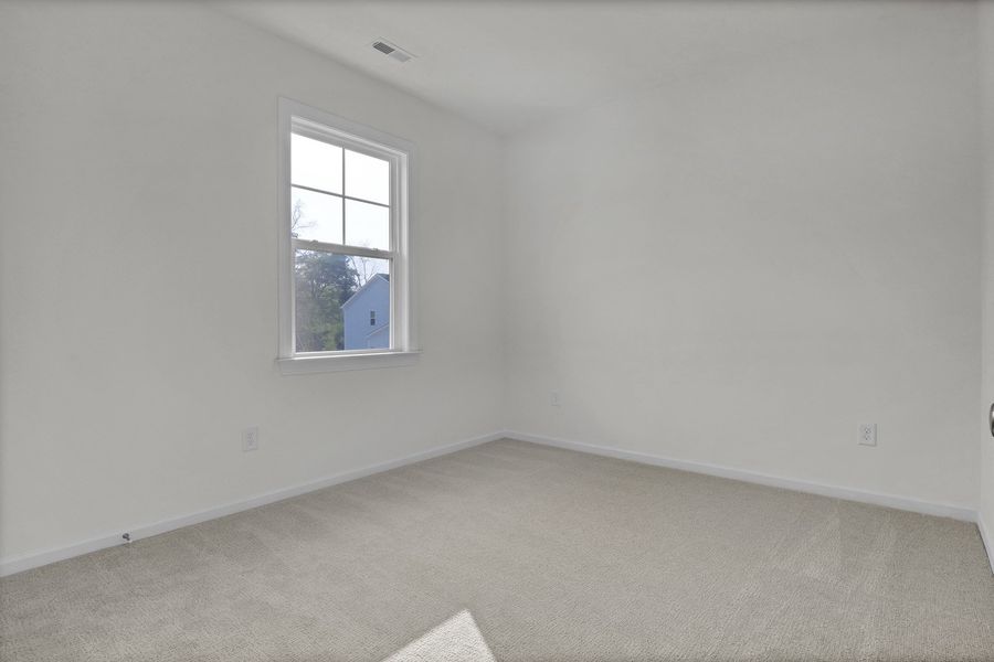 Spacious, unfurnished interior of a new home in Indigo at Abbey Preserve, Wilmington (Image 29).