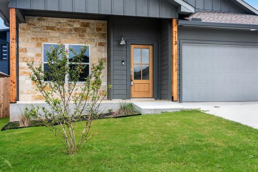 Front exterior of a new home in , Fredericksburg, TX, highlighting curb appeal (Image 2).