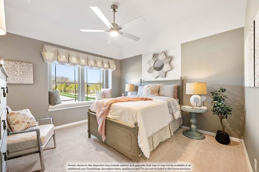 Bedroom with vaulted ceiling, ceiling fan, large window, and neutral carpet flooring