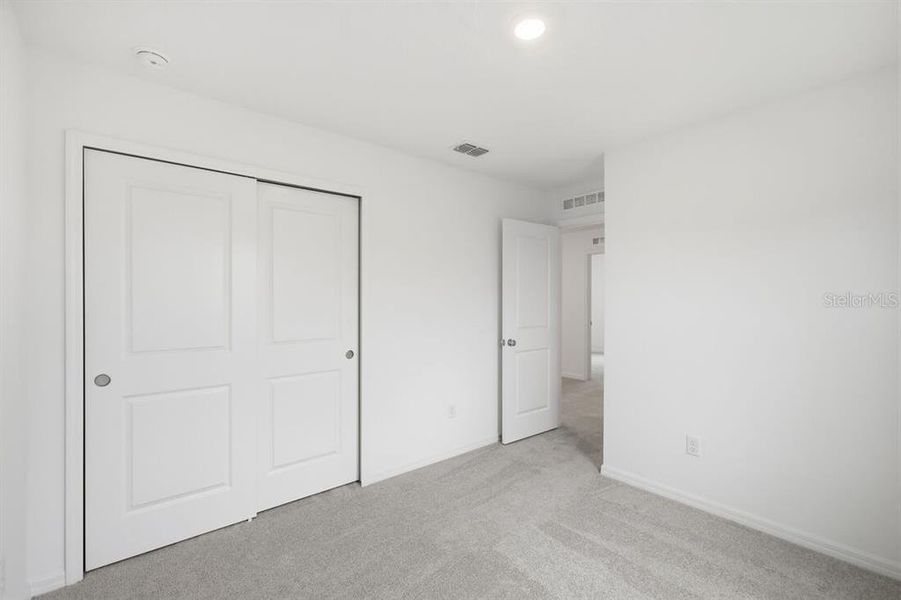 Spacious, unfurnished interior of a new home in Waterstone, Groveland (Image 43).