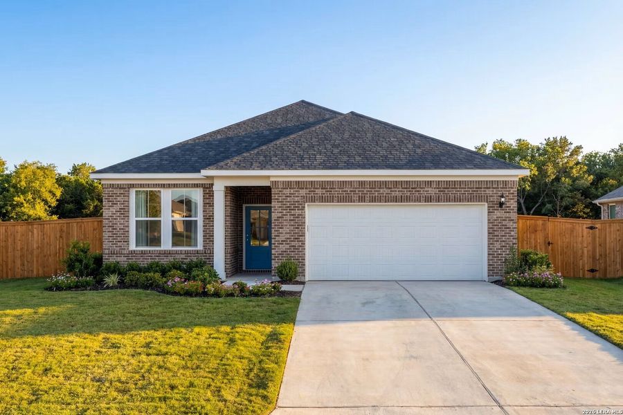Front exterior of a new home in Comanche Ridge, San Antonio, TX, highlighting curb appeal (Image 1). Front exterior of a new home in Comanche Ridge, San Antonio, TX, highlighting curb appeal (Image 1).