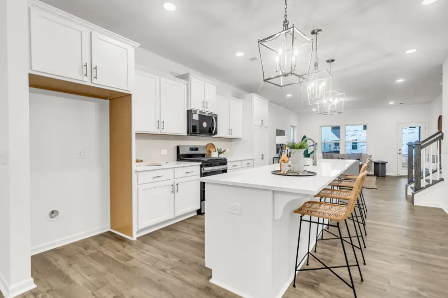 Furnished interior view inside a new home in Homecoming, Ravenel (Image 6).