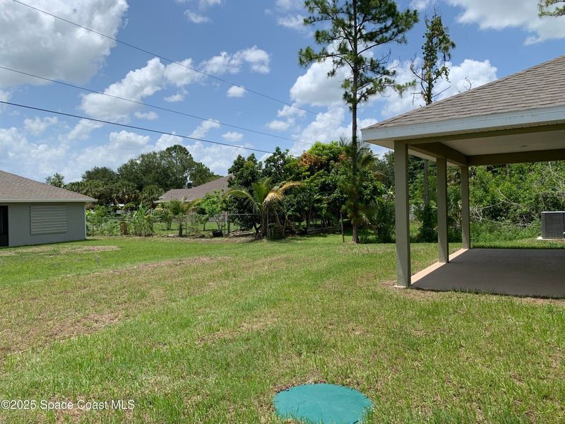 Exterior details and patio area of a home in Palm Bay, Palm Bay (Image 18). Exterior details and patio area of a home in Palm Bay, Palm Bay (Image 18).