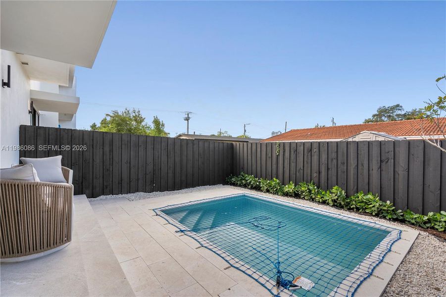 Exterior details and patio area of a home in , Miami (Image 4). Exterior details and patio area of a home in , Miami (Image 4).