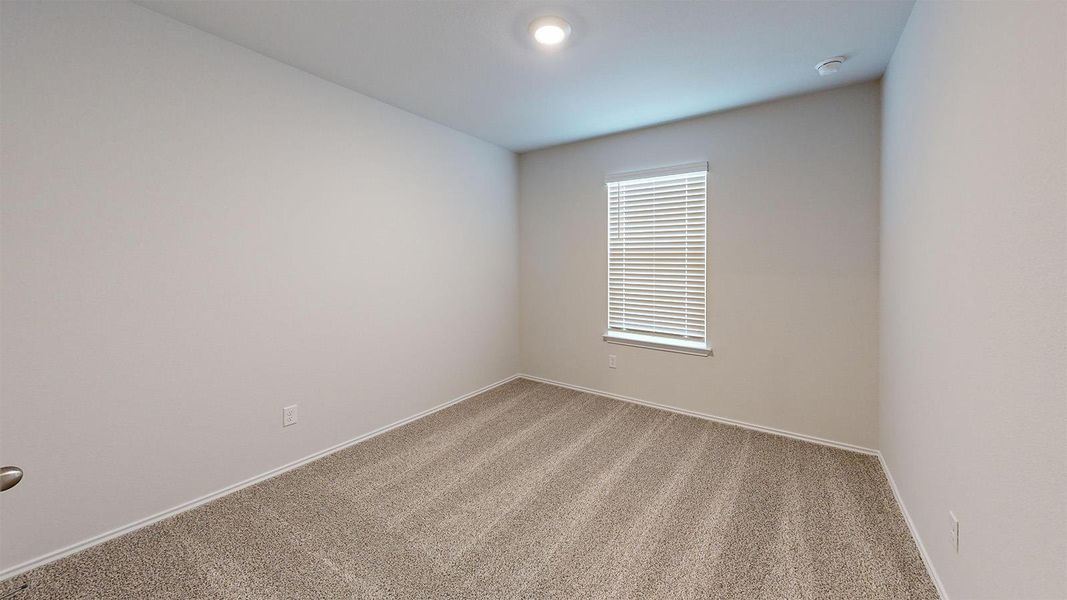Unfurnished room with light carpet and baseboards