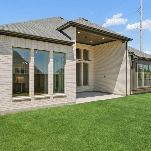 Exterior details and patio area of a home in The Parks at Wilson Creek, Celina (Image 28).