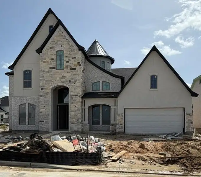 This home is a show-stopper from the street wth its high-pitched roof line and round turret peeking out from above. This home is a show-stopper from the street wth its high-pitched roof line and round turret peeking out from above.
