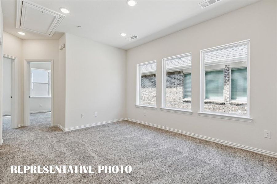 The entire family will love the spacious, light filled upstairs game room in this wonderful home!  REPRESENTATIVE PHOTO