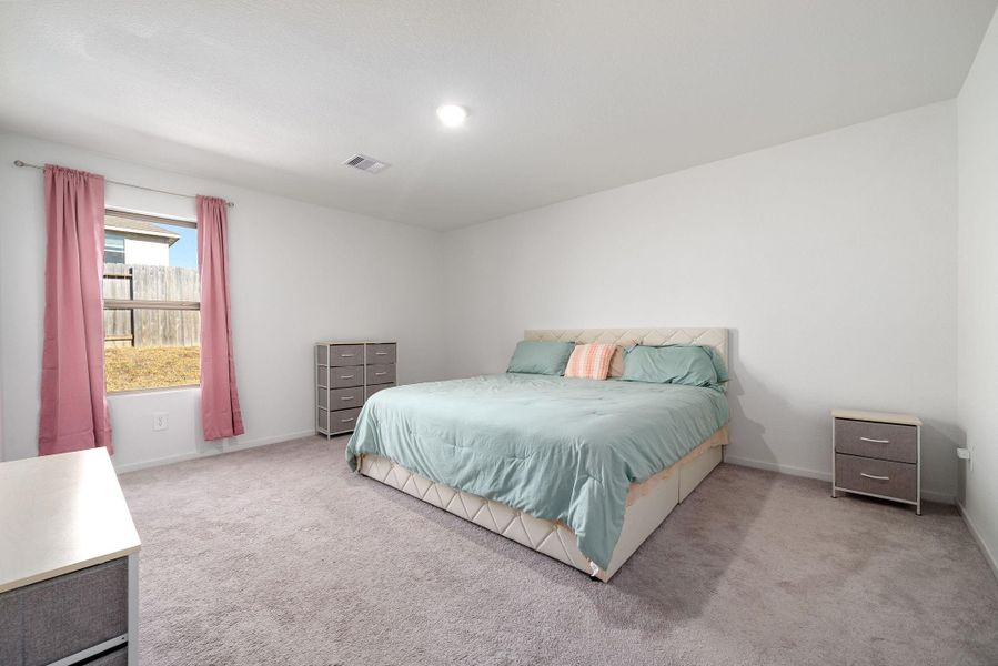 Furnished interior view inside a new home in Ladera Trails, Conroe (Image 9).