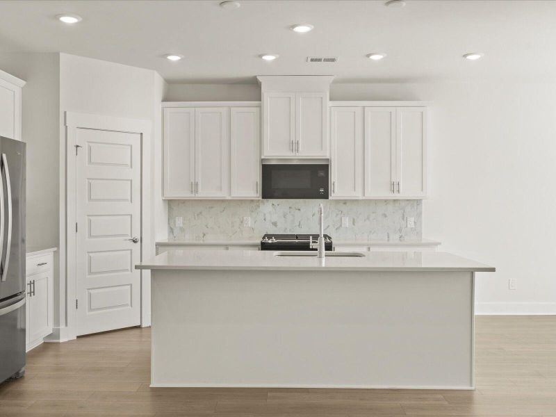 Furnished interior view inside a new home in The Coves at Lakes of Cane Bay II, Summerville (Image 10).