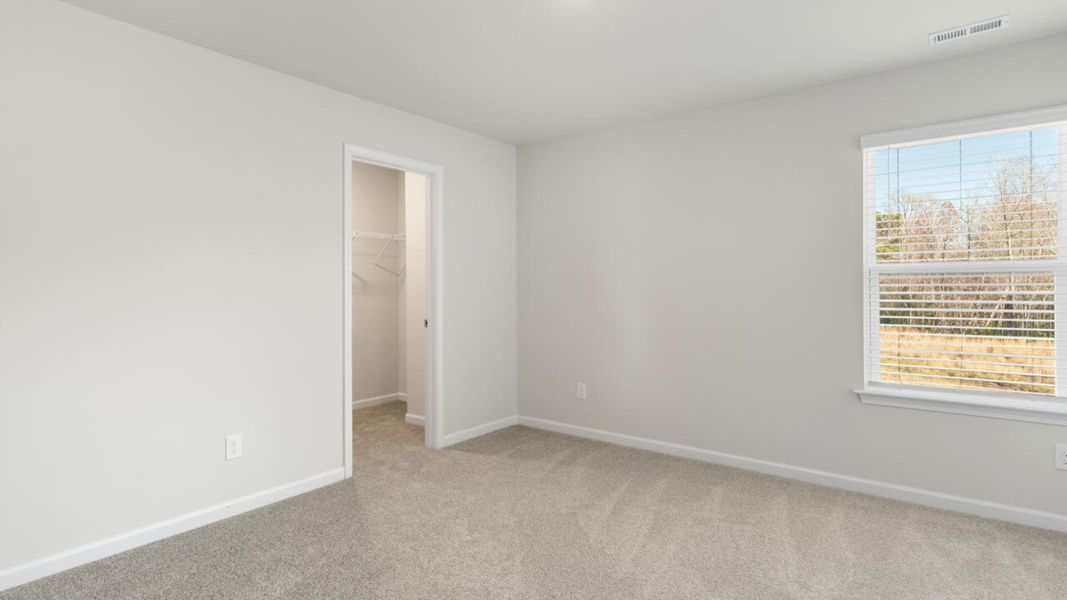 Spacious, unfurnished interior of a new home in The Preserve at Tidewater, Sneads Ferry (Image 37).