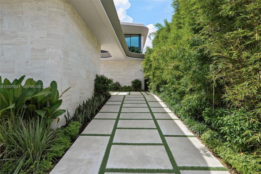 Exterior details and patio area of a home in , Miami Beach (Image 27). Exterior details and patio area of a home in , Miami Beach (Image 27).