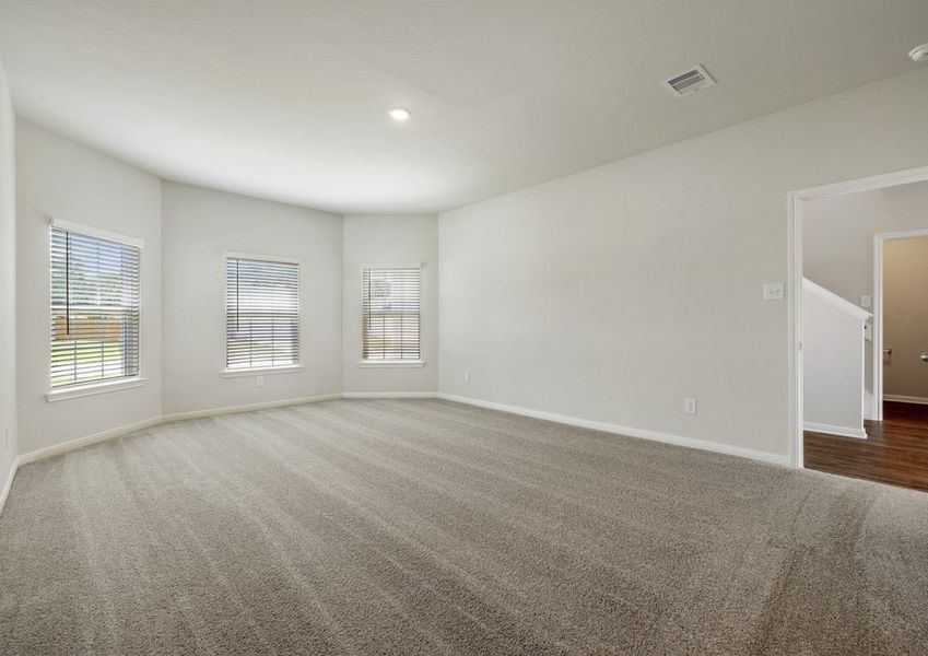 Master bedroom with bay windows facing the front yard