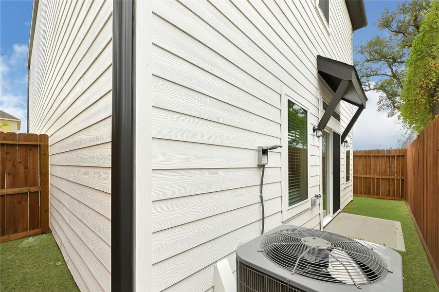 Exterior details and patio area of a home in , Houston (Image 3).