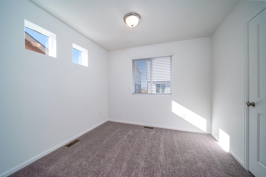 Spacious, unfurnished interior of a new home in Muegge Farms, Bennett (Image 21).