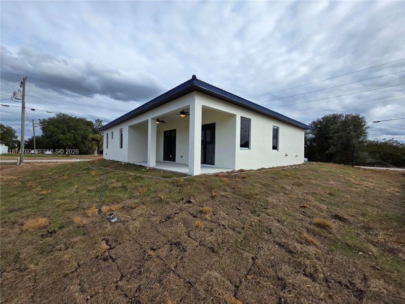 Exterior details and patio area of a home in , Lehigh Acres (Image 3).