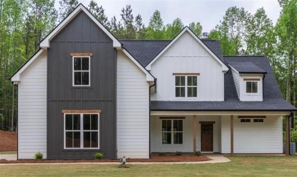 Front exterior of a new home in , Carrollton, GA, highlighting curb appeal (Image 1). Front exterior of a new home in , Carrollton, GA, highlighting curb appeal (Image 1).