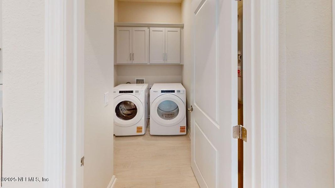 Furnished interior view inside a new home in RiverTown - WaterSong, St. Johns (Image 11).