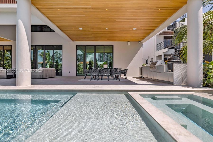Exterior details and patio area of a home in , North Miami (Image 34).