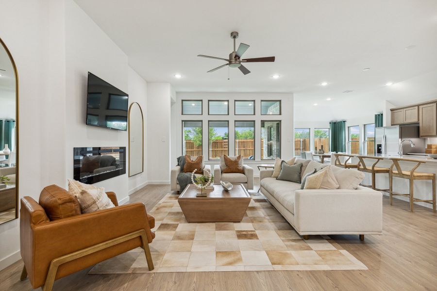 Living room in the Gilmour home plan by Trophy Signature Homes – REPRESENTATIVE PHOTO