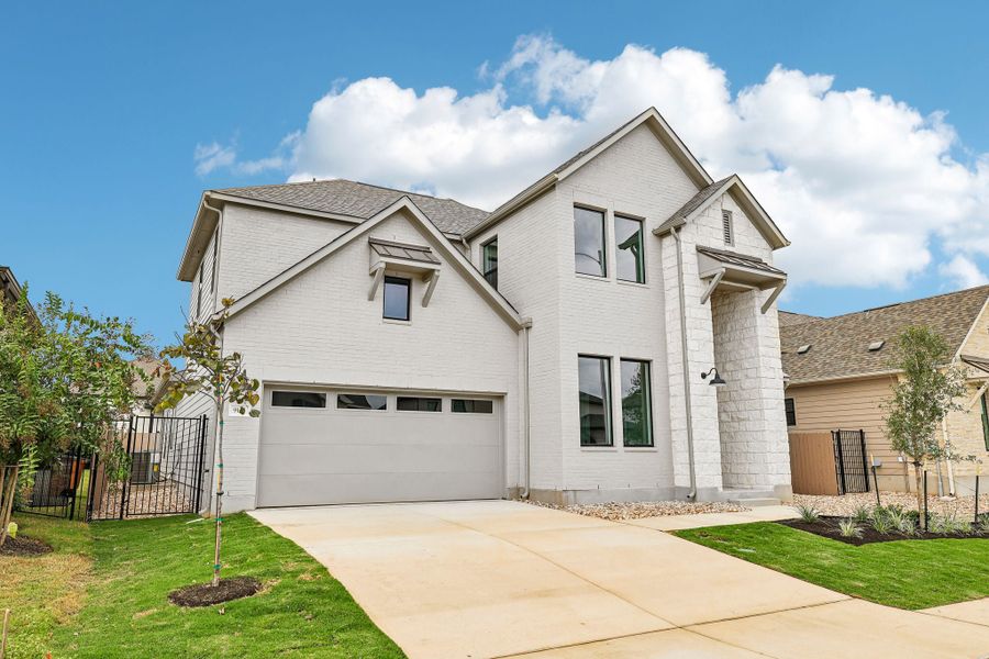 Representative exterior photo of a completed home built from the McNeil by Taylor Morrison in Silverleaf, Cedar Creek, TX (Image 25). Representative exterior photo of a completed home built from the McNeil by Taylor Morrison in Silverleaf, Cedar Creek, TX (Image 25).