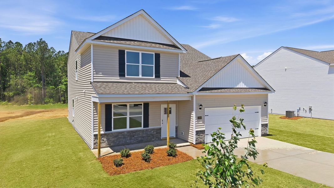 Front exterior of a new home in Beaver Dam Crossing, Bailey, NC, highlighting curb appeal (Image 19). Front exterior of a new home in Beaver Dam Crossing, Bailey, NC, highlighting curb appeal (Image 19).