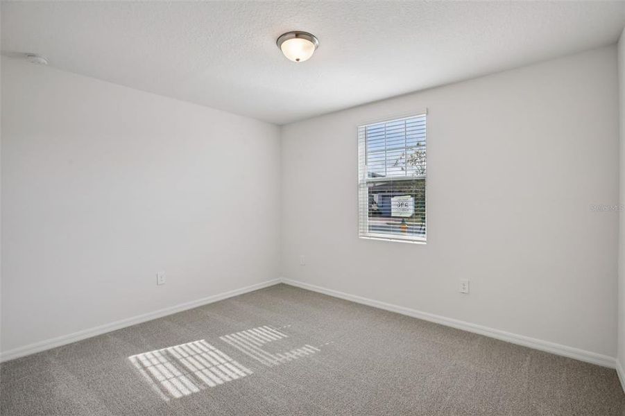 Spacious, unfurnished interior of a new home in Villamar - Signature Series, Winter Haven (Image 16).