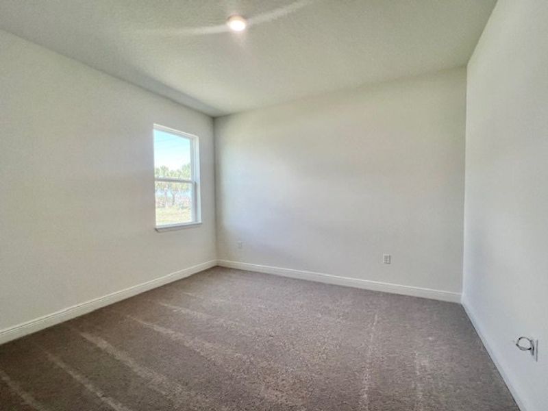 Spacious, unfurnished interior of a new home in Lakes At St Sebastian, Micco (Image 16).