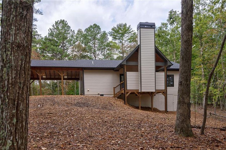Exterior details and patio area of a home in , Ellijay (Image 28).