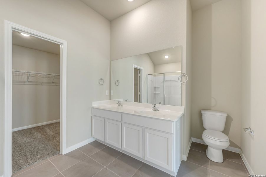 Furnished interior view inside a new home in Hunters Ranch, San Antonio (Image 11).