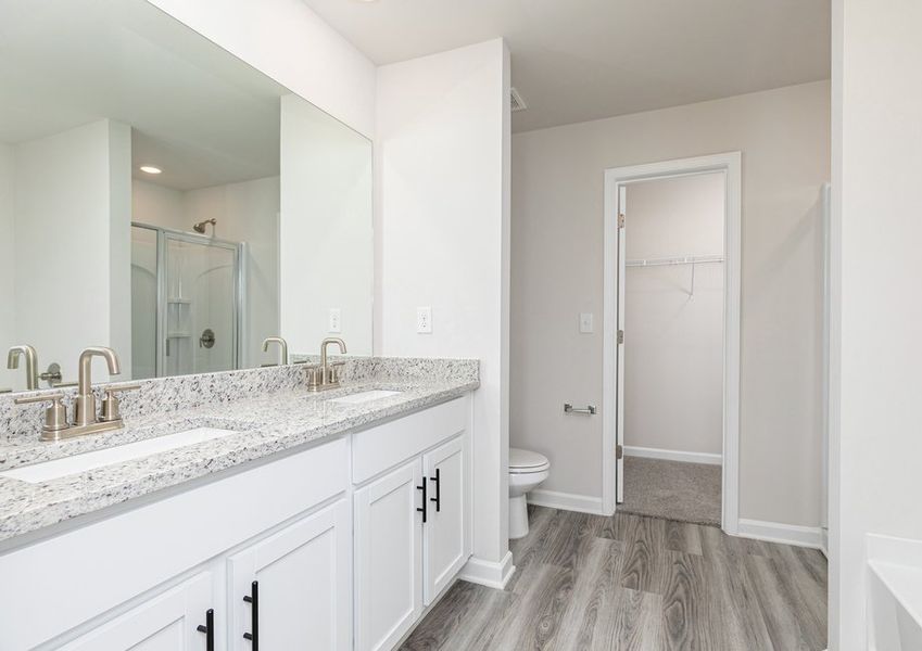 Get ready for your day in the master bathroom