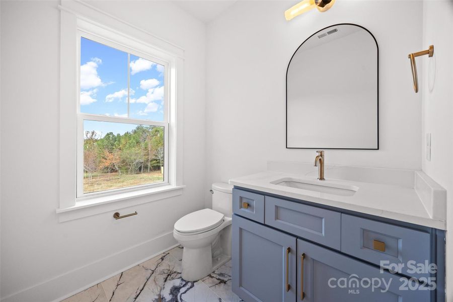 Powder Room with Laundry on Second Floor