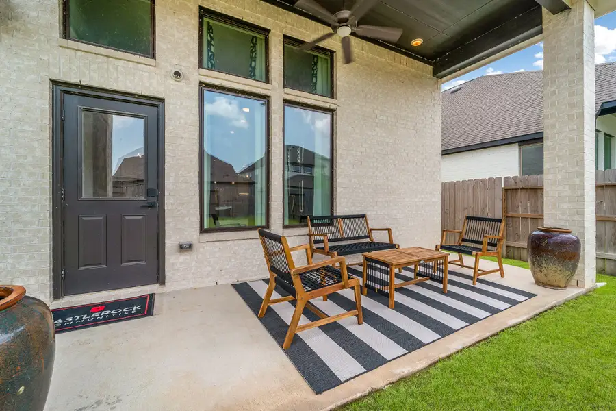 Exterior details and patio area of a home in Massey Oaks, Pearland (Image 2).