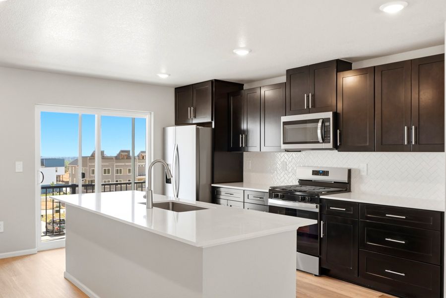 Furnished interior view inside a new home in Three Hills, Morrison (Image 3).