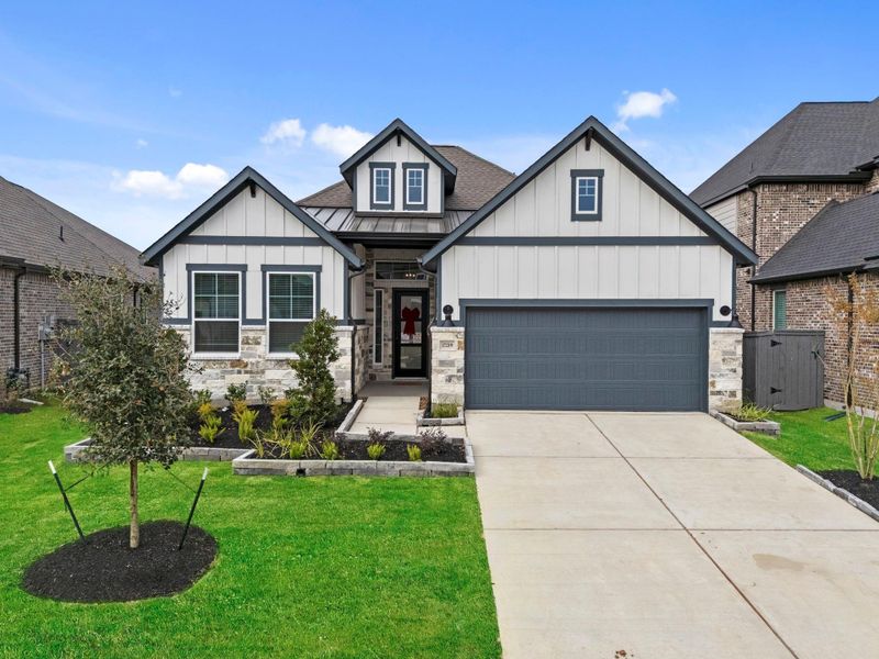 Front exterior of a new home in Jubilee Chateau, Hockley, TX, highlighting curb appeal (Image 23).
