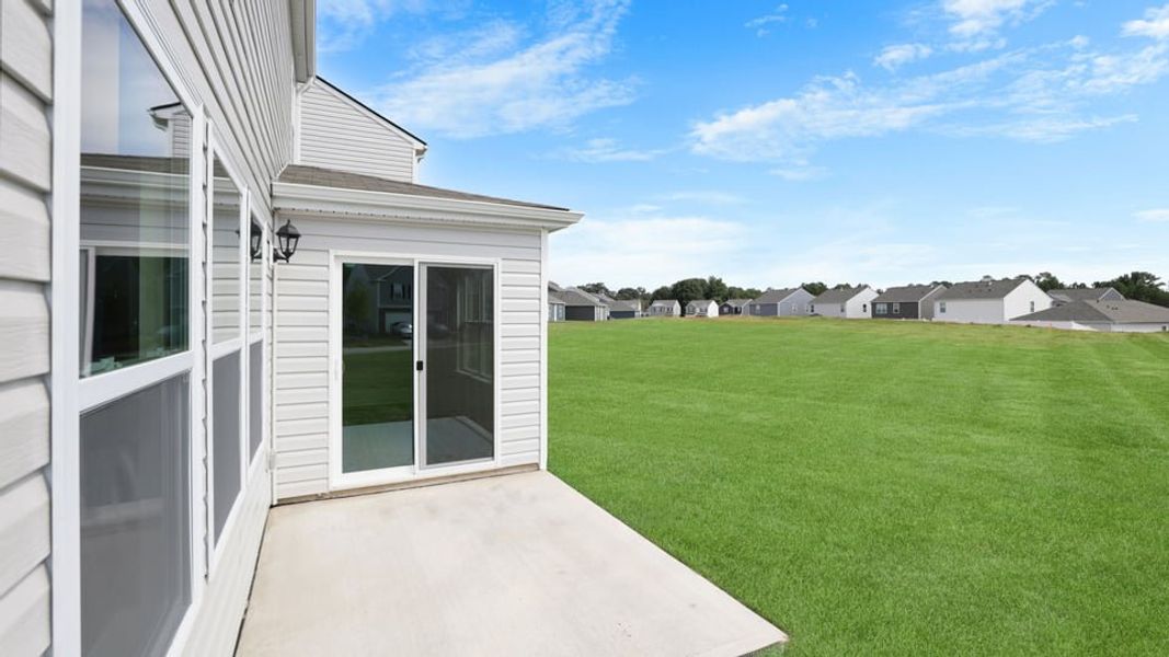 Exterior details and patio area of a home in Harper Ridge, Roebuck (Image 3).