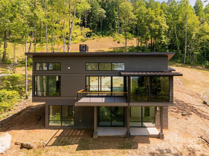Front exterior of a new home in , Hendersonville, NC, highlighting curb appeal (Image 22).